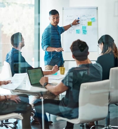 presentation-being-given-in-conference-room-to-colleagues